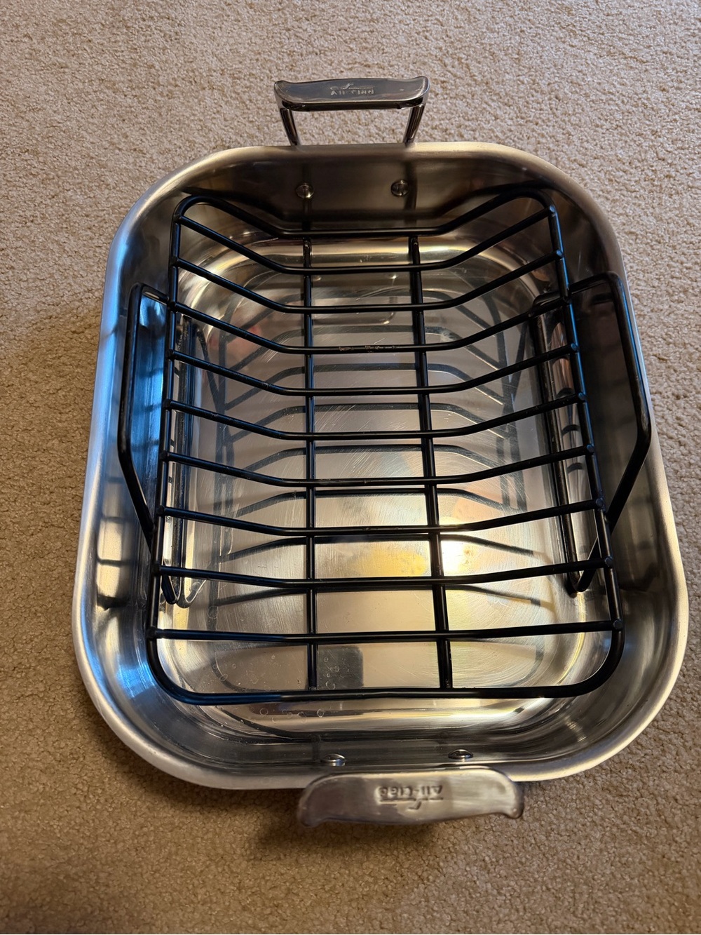Stainless Steel Roaster with Black Rack by All-Clad. Used couple times.